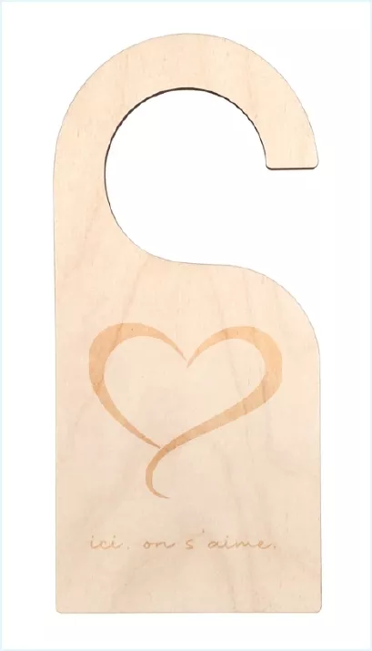 Plaque de porte pour poignée avec accroche cintre